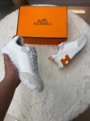 Hermes Bouncing White Orange Logo
