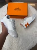 Hermes Bouncing White Orange Logo