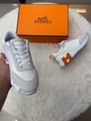 Hermes Bouncing White Orange Logo