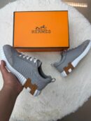 Hermes Bouncing Grey Brown Logo